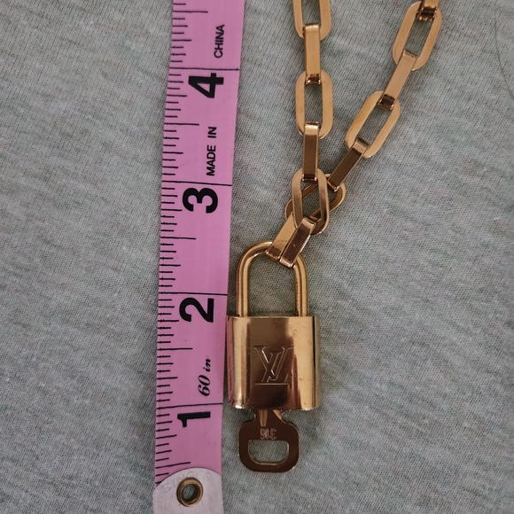 Authentic Louis Vuitton lock pendant - Picture 9 of 10